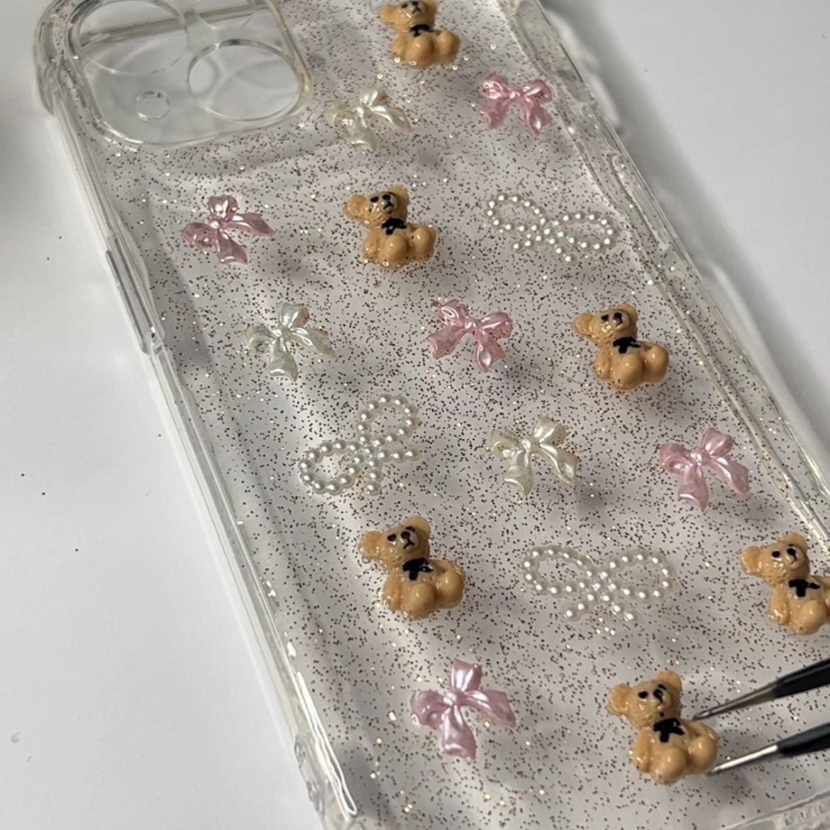 The Sweet Spot Phone Case, Pink and Pearl Bows, Teddy Bear, Making Process Lower Angle